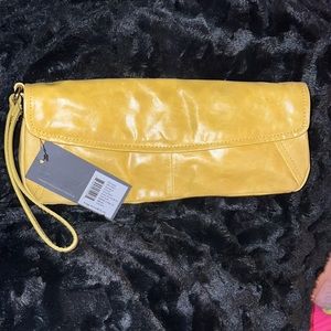 Brand new Yellow Kenneth Cole clutch with wristlet